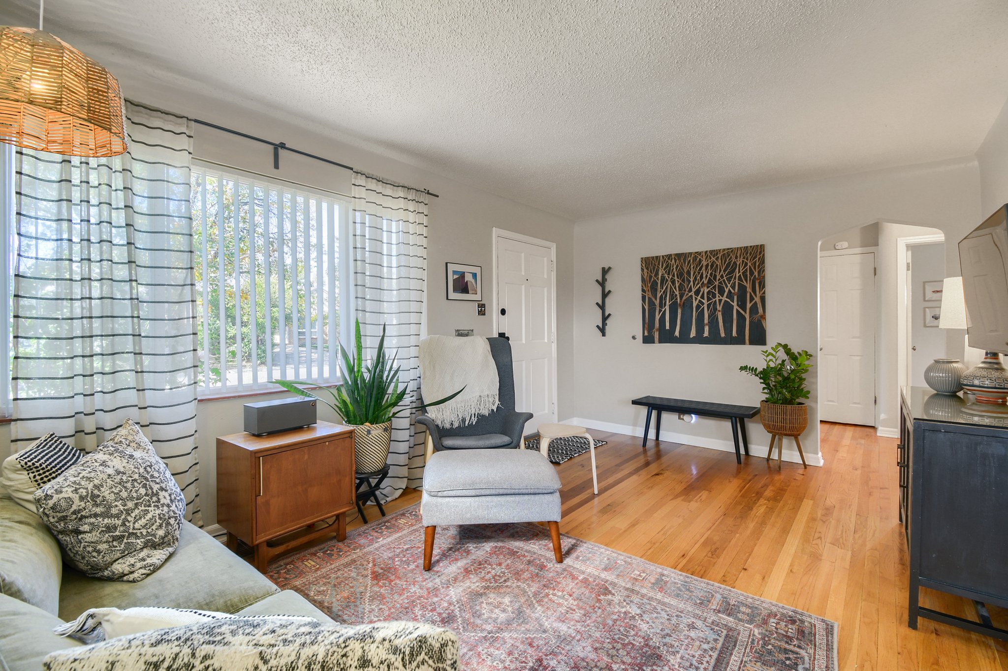 Living room with hardwood floors and picture window